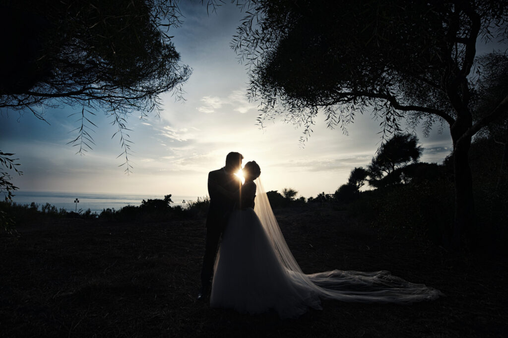Marriage of woman and man embracing in darkness